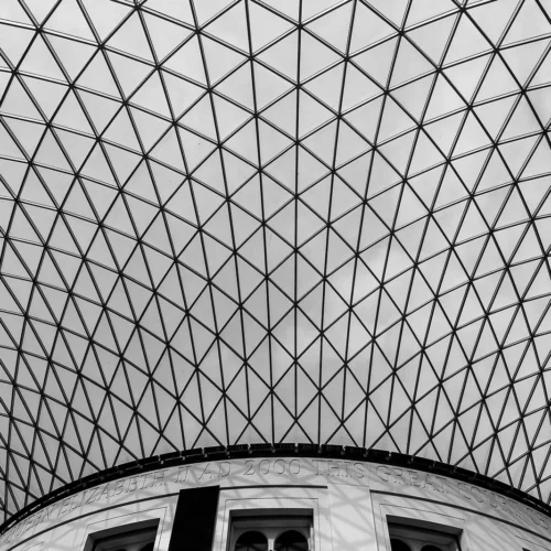 Geometric glass roof above the British Museum Great Court in London.